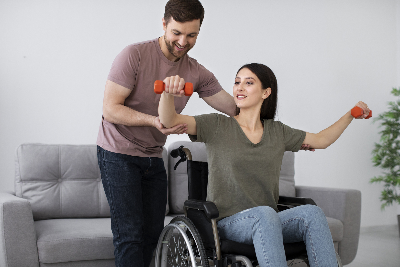 young-adult-helping-disabled-friend